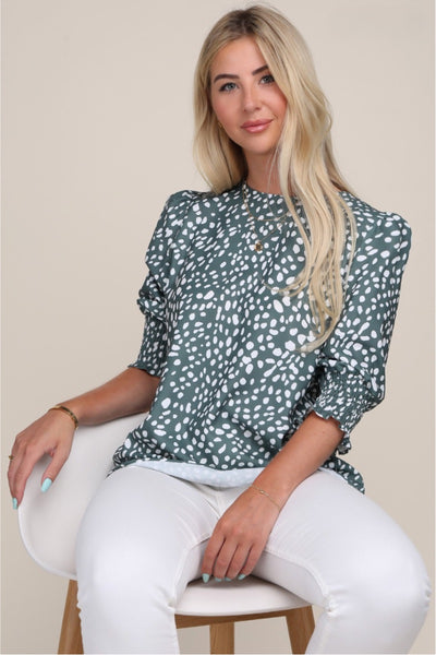 green and white blouse